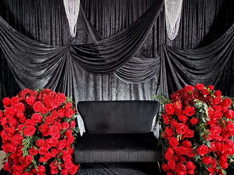 Swag drape — black velvet with rose styling