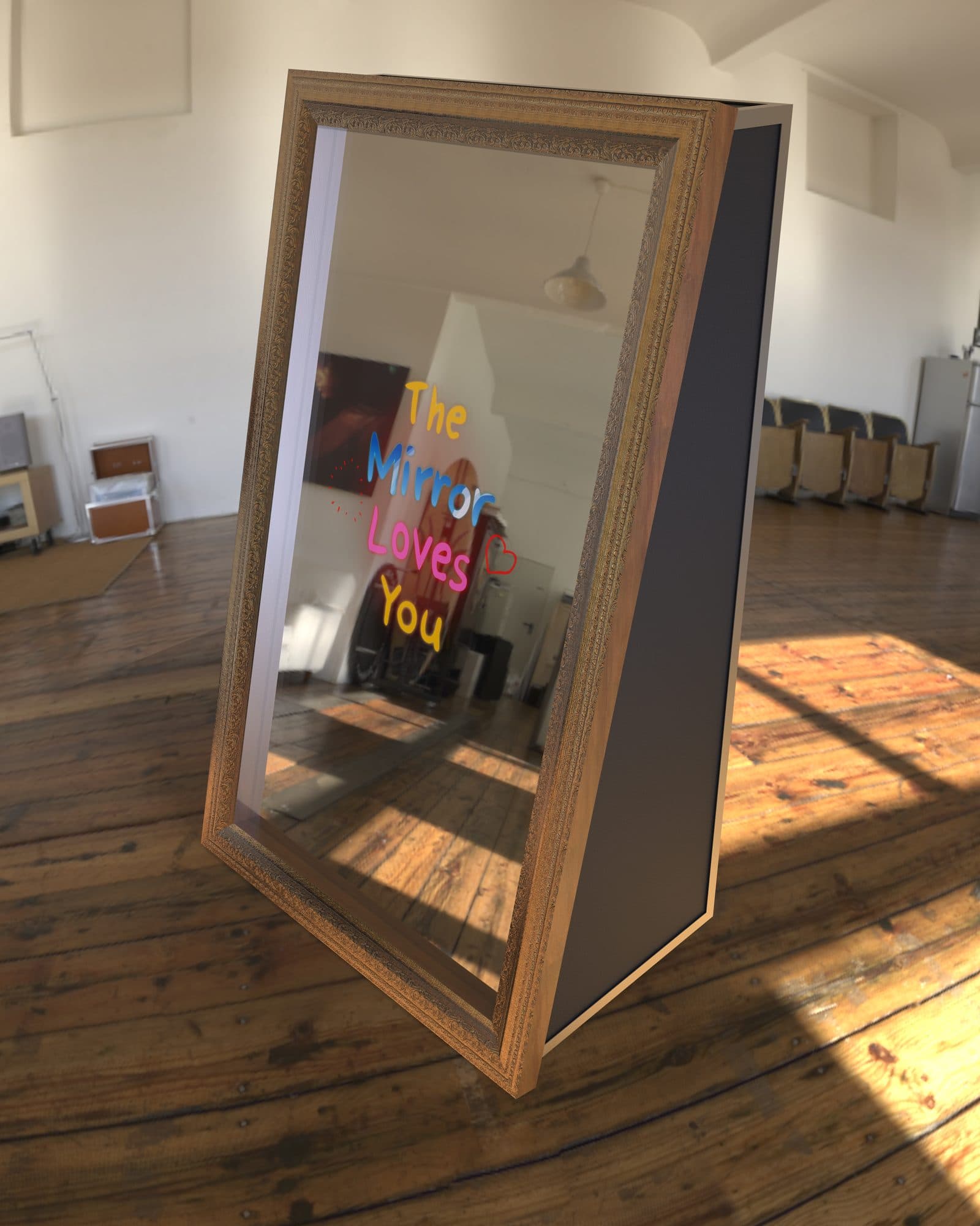 The mirror booth standing in a sunlit room, showing its gold frame and dark side panel